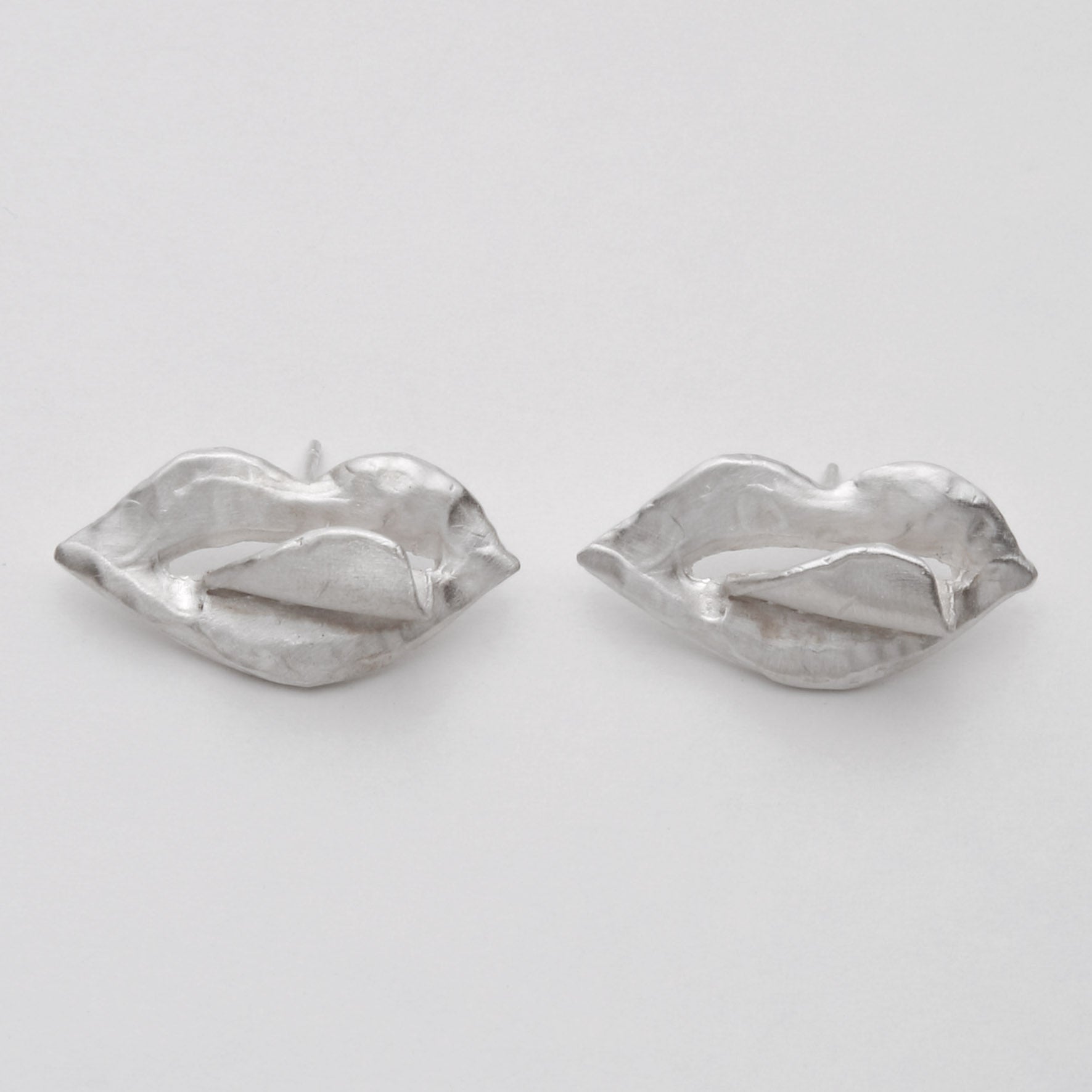 TONGUE EARRINGS