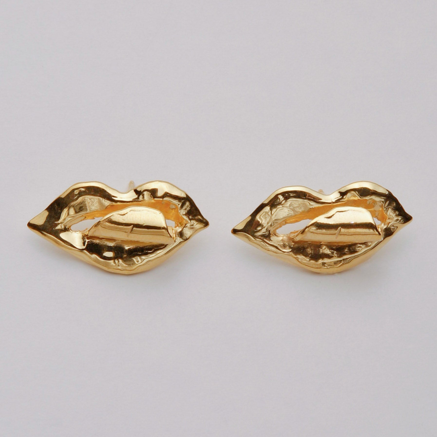 TONGUE EARRINGS