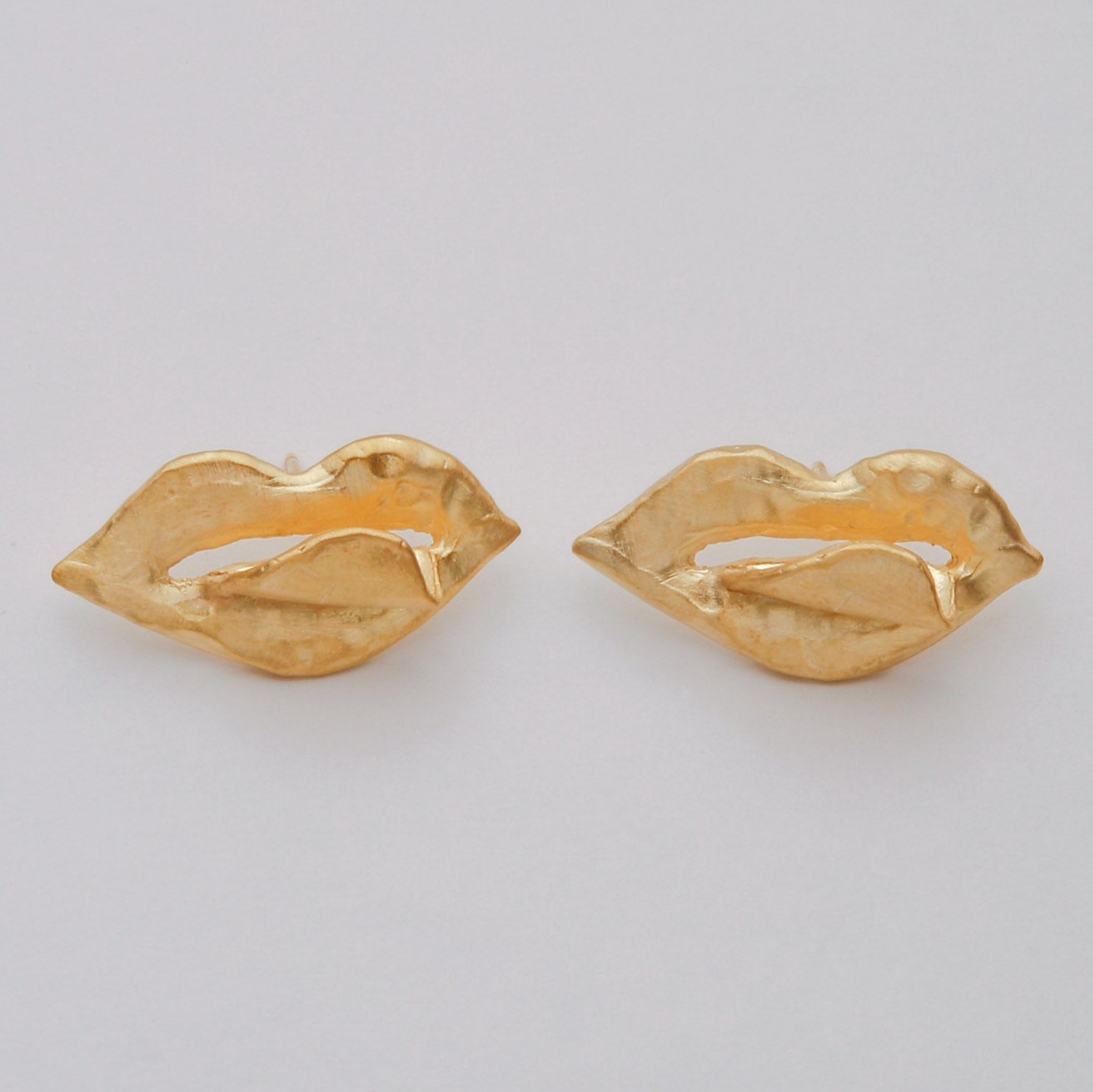 TONGUE EARRINGS